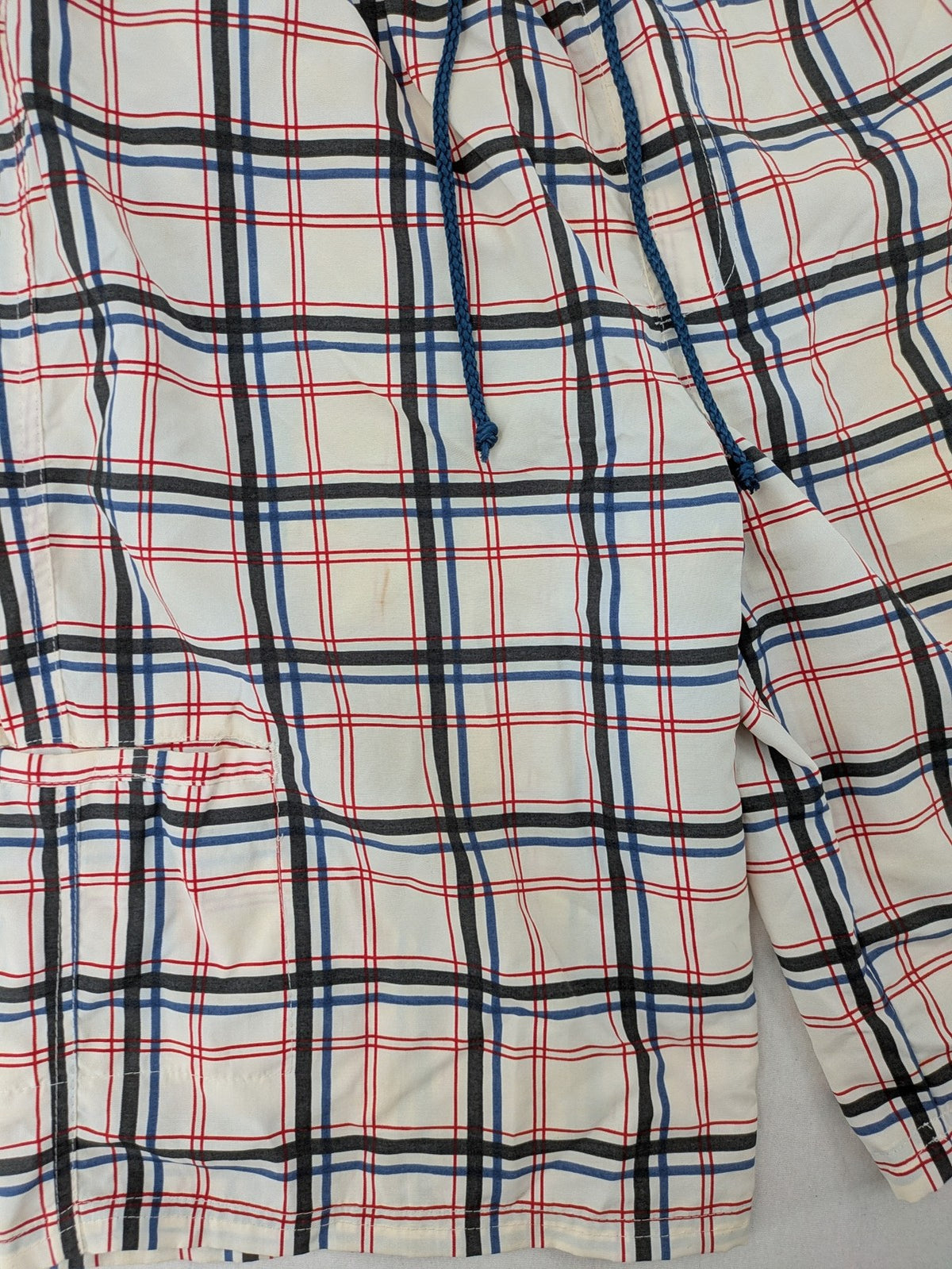 Crivit multi-coloured board shorts with classic check pattern and adjustable drawstring waistband.