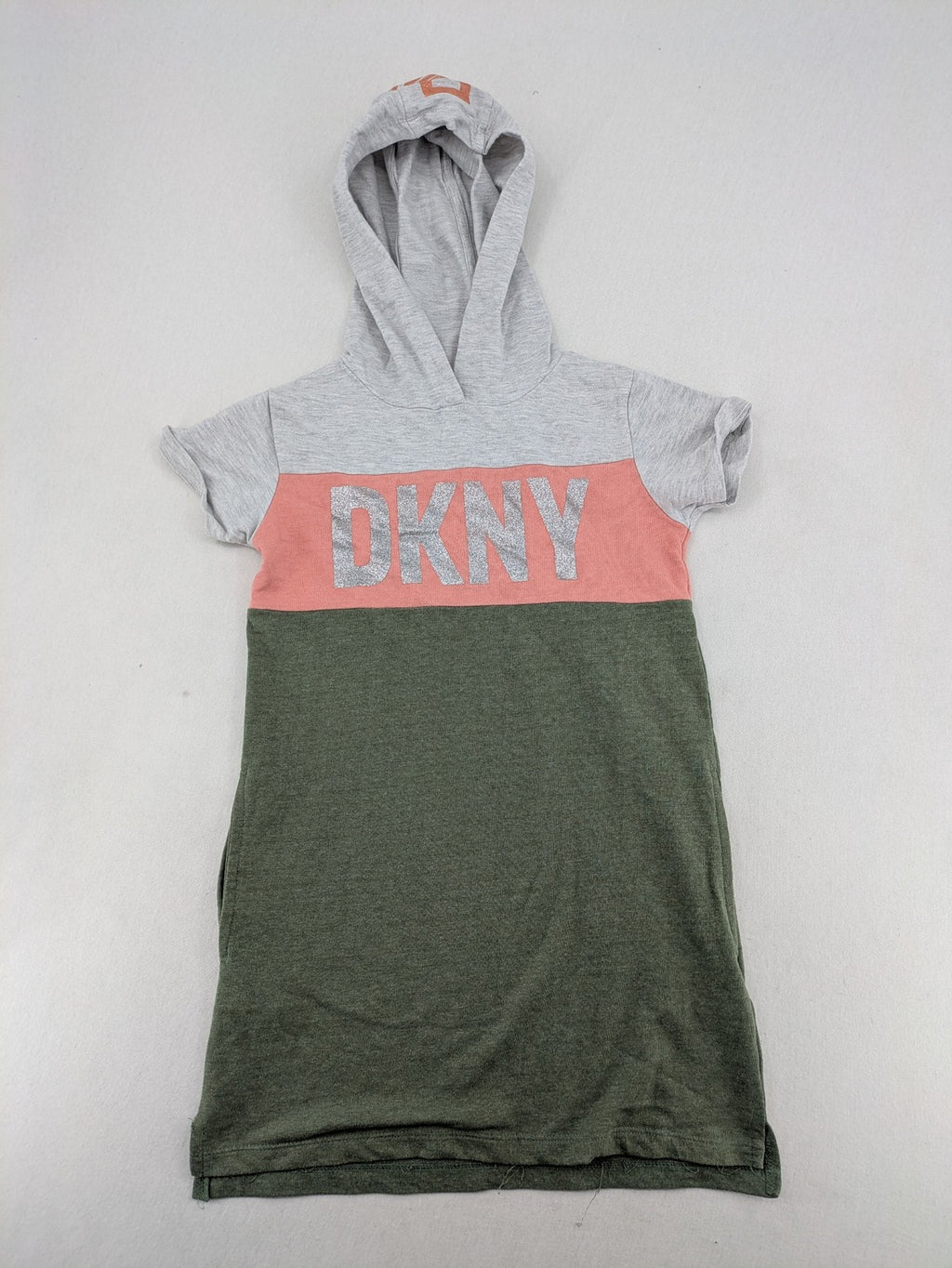 DKNY pink hoodie dress colorblock design with glitter logo and short sleeves.