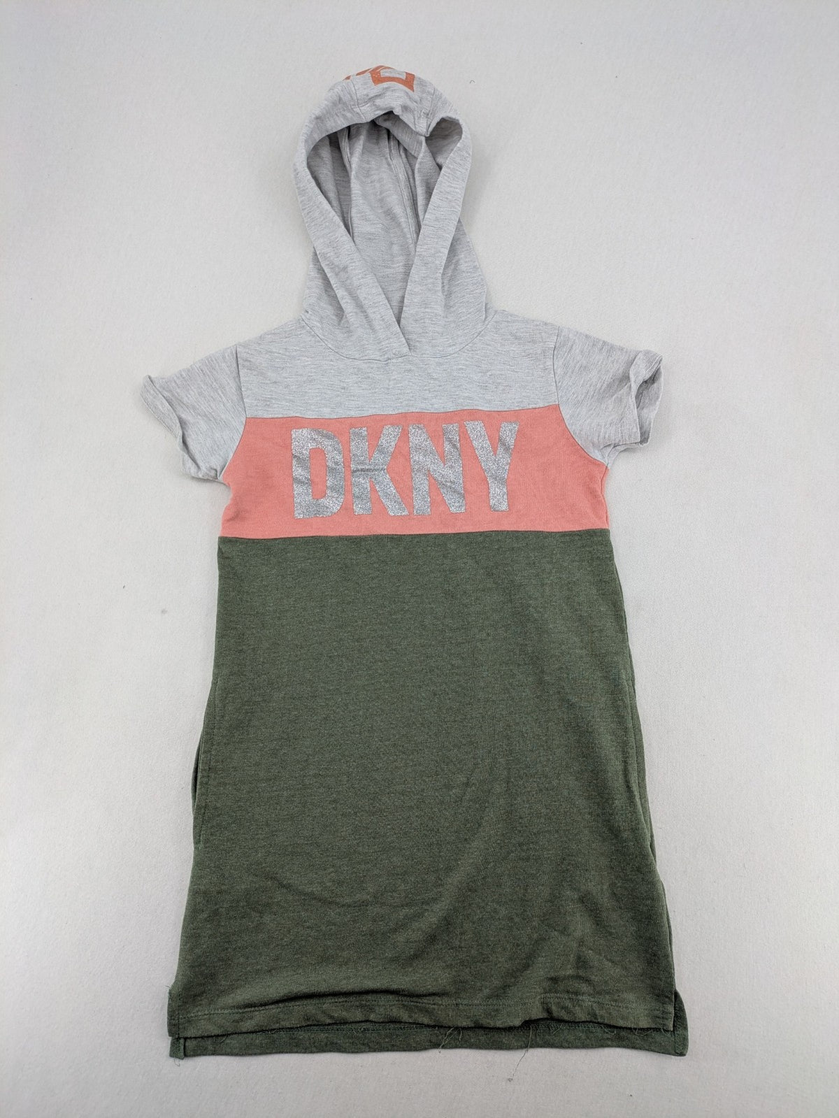 DKNY pink hoodie dress colorblock design with glitter logo and short sleeves.
