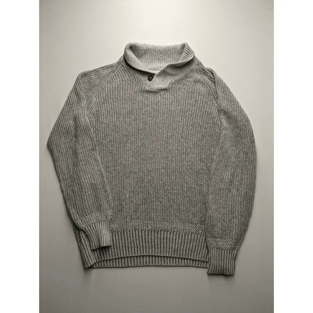 Autumn Glow grey turtle neck jumper with ribbed pattern and button detail.