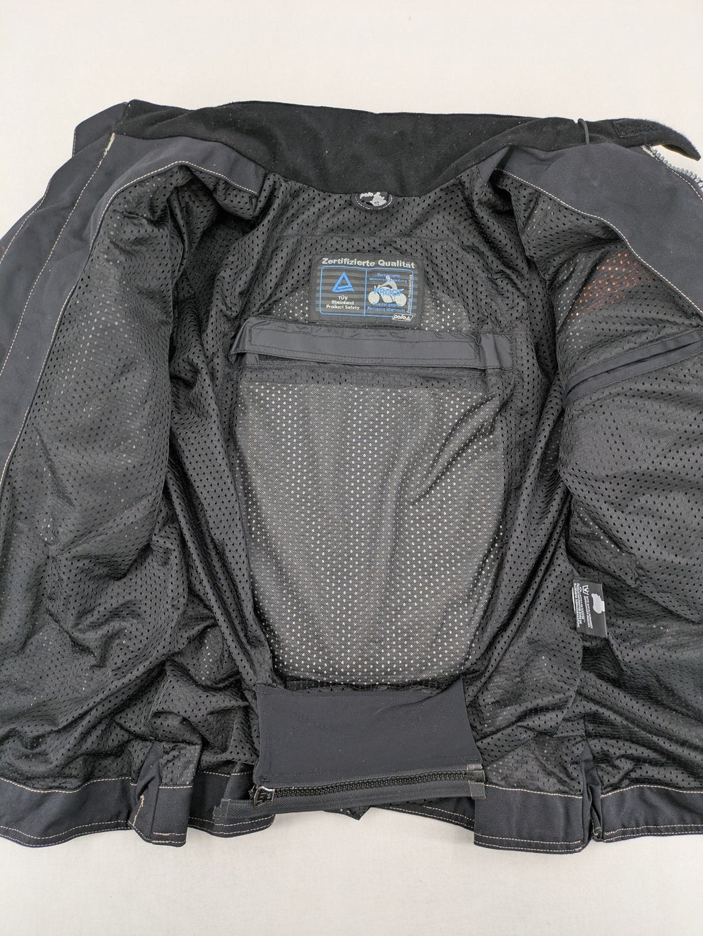 Polo multi biker jacket nylon with adjustable fit and multiple pockets.