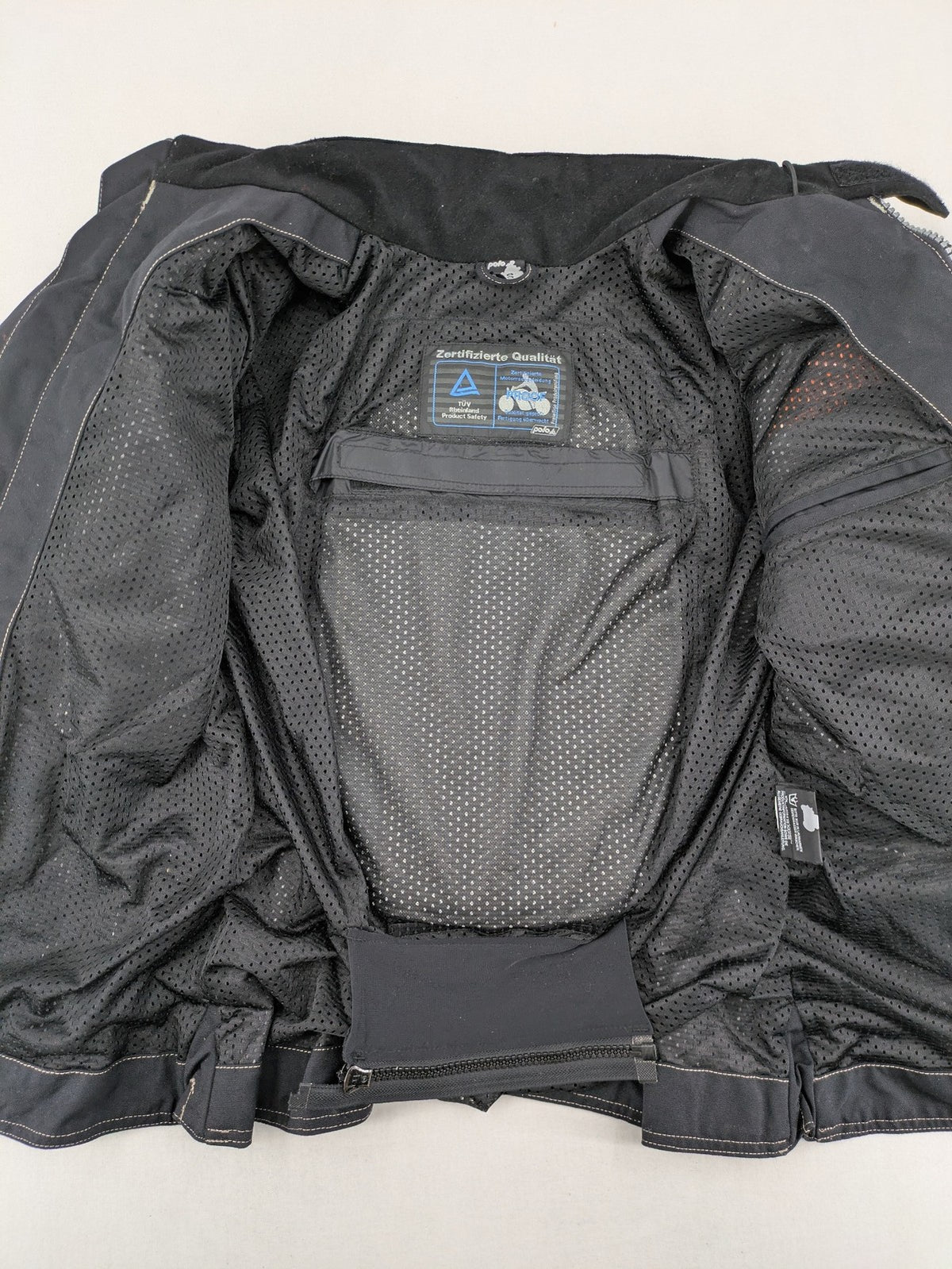 Polo multi biker jacket nylon with adjustable fit and multiple pockets.