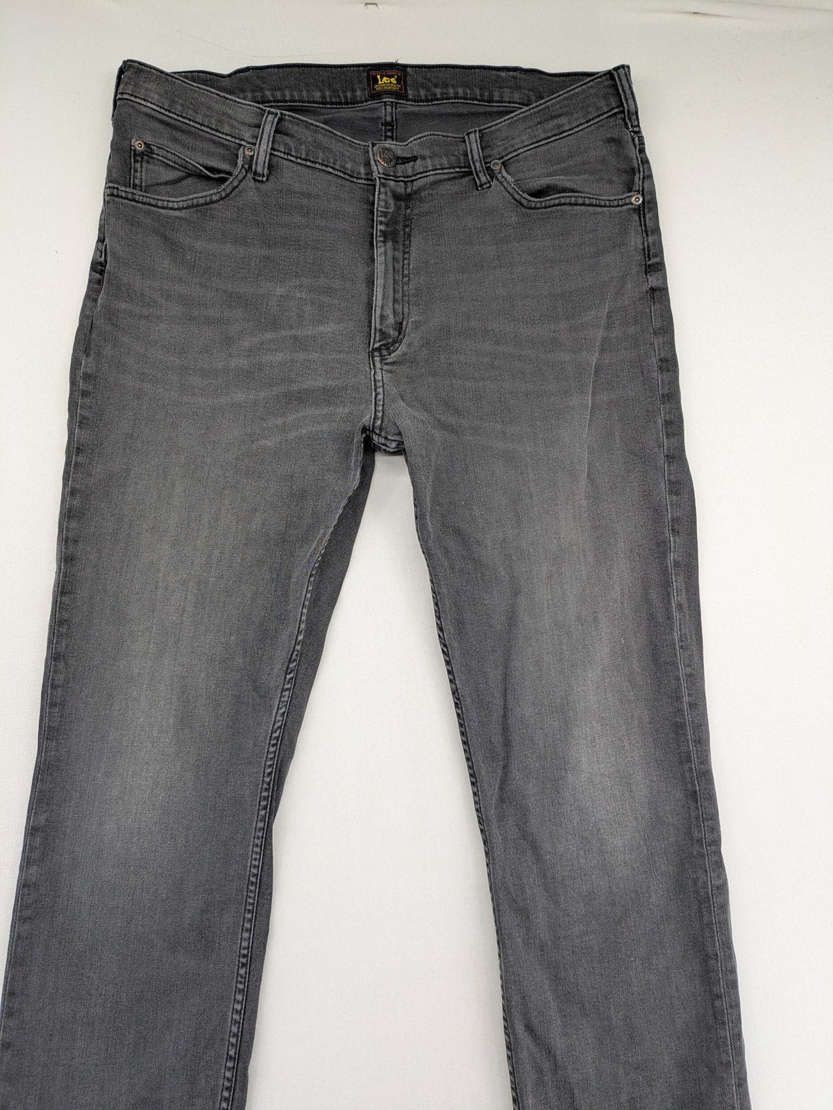 Lee straight jeans grey 5-pocket design with subtle branding on back pocket.