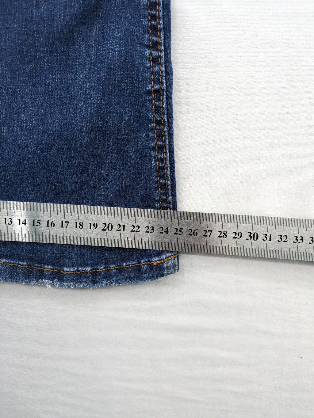 Pull&Bear blue flare jeans high waist with classic button closure and stylish silhouette.