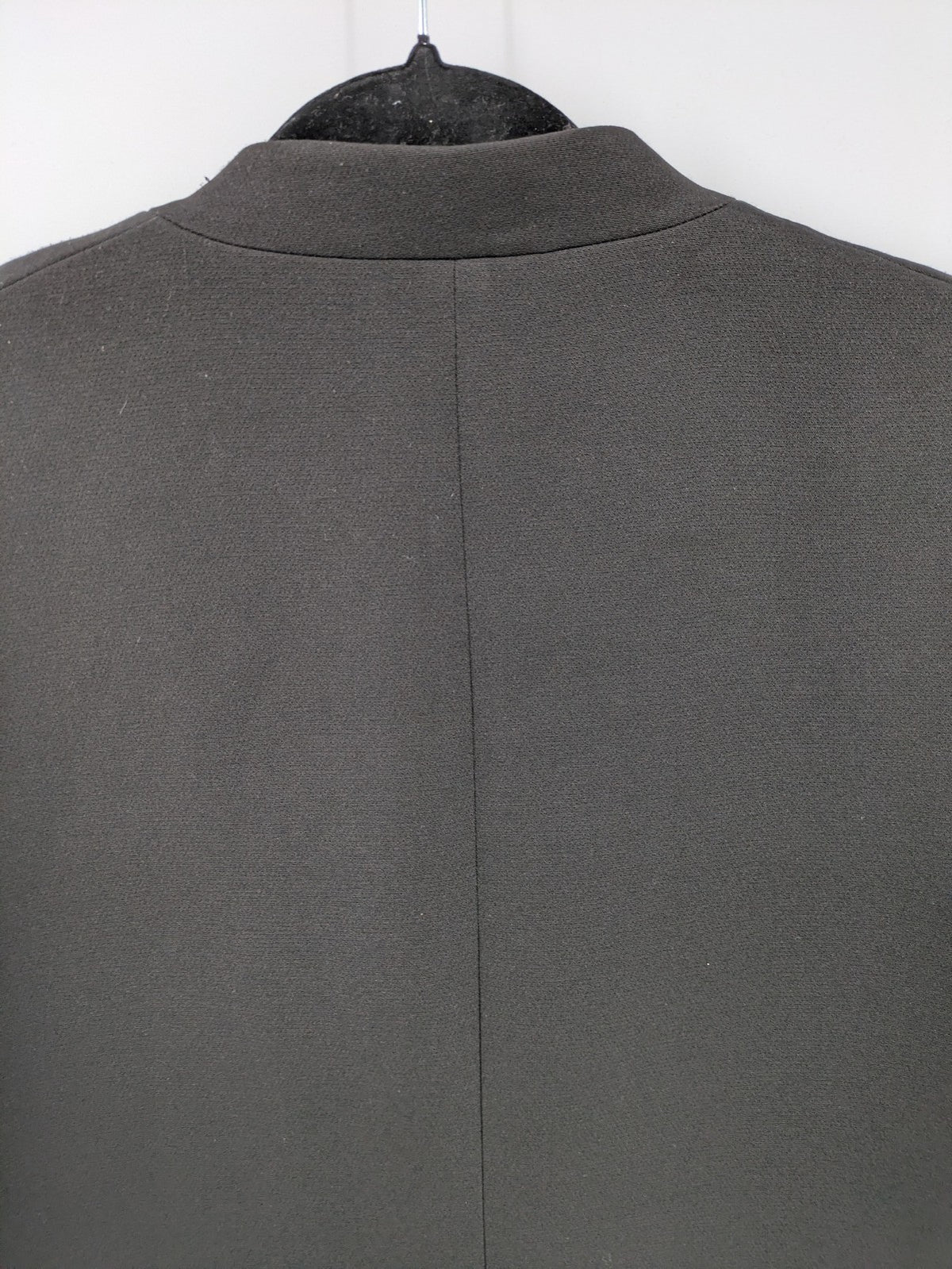 H&M pink long blazer kragenlos design with open front and two front pockets.