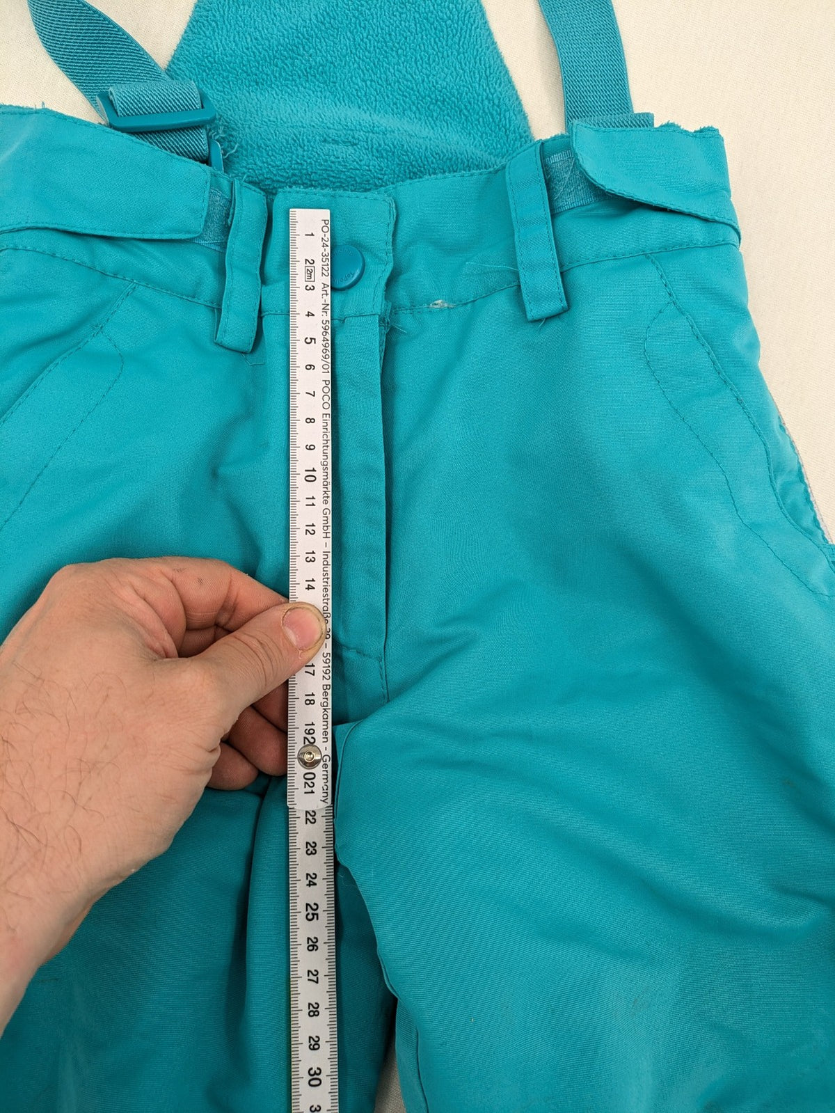 Topolino blue and turquoise snow pants with adjustable straps and fleece-lined bib.