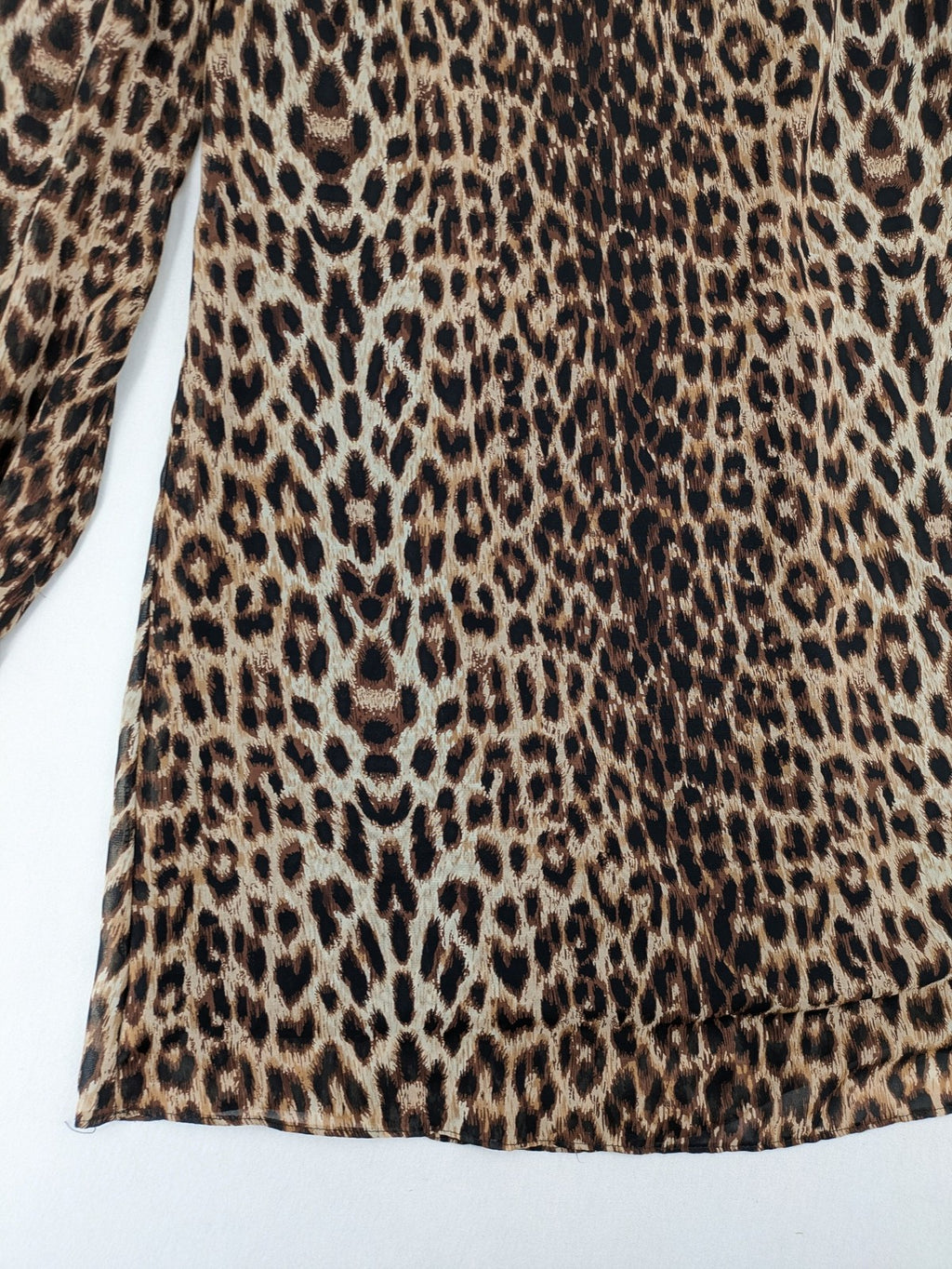 Atmosphere beige leopard print dress with sheer chiffon sleeves and buttoned cuffs.