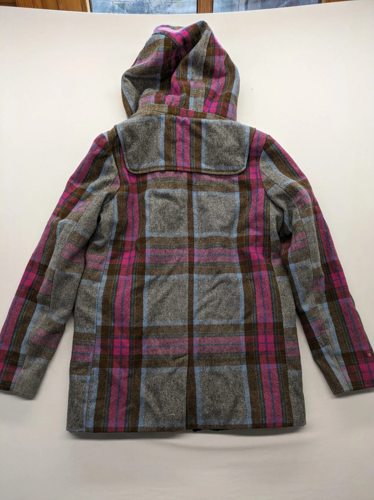 Johnnie B pink coat with gray check pattern, Sherpa lining, and zip closure.