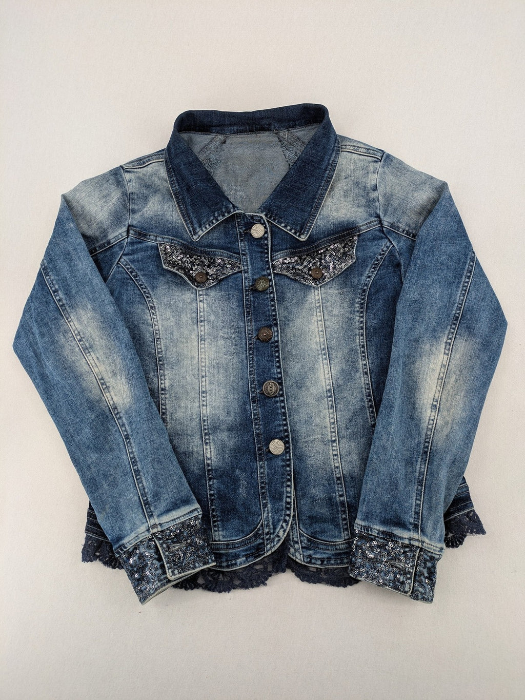 TREDY blue denim jacket with sequins, lace trim, and fitted design.