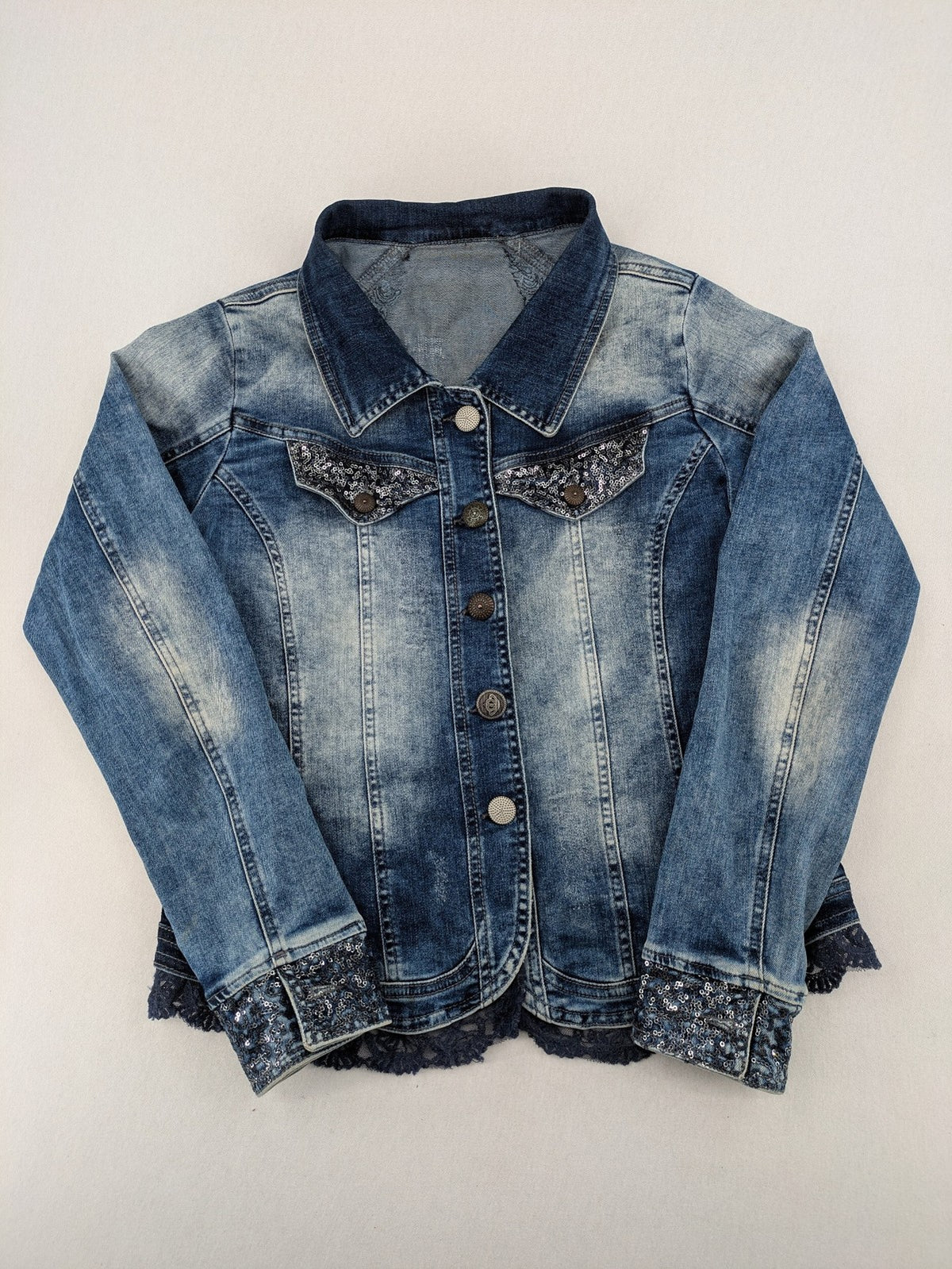 TREDY blue denim jacket with sequins, lace trim, and fitted design.