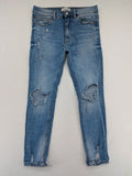 Pull&Bear blue carrot fit jeans with distressed knees and frayed hems.