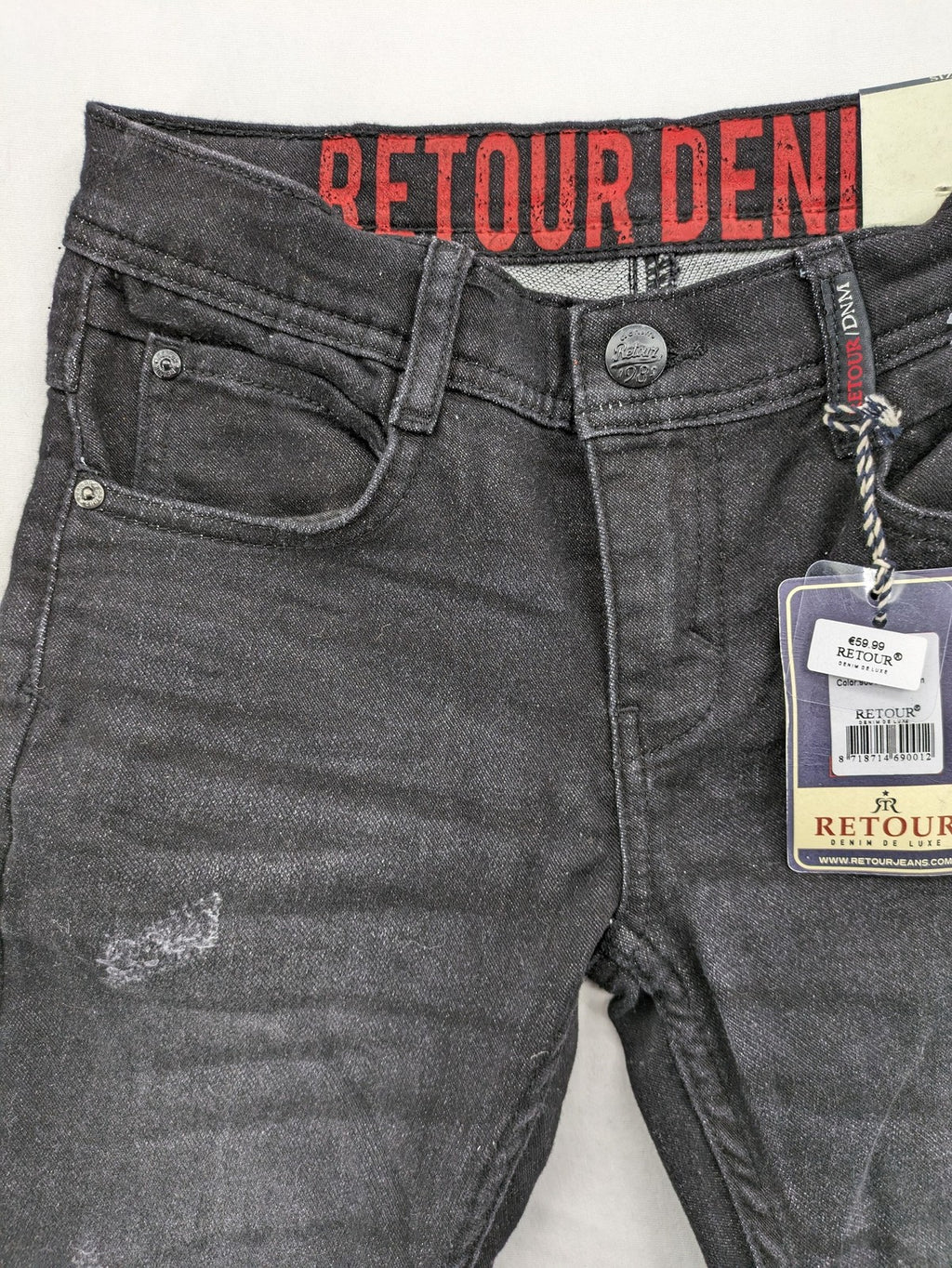 Skinny black straight jeans with distressed details and logo, made from durable denim.