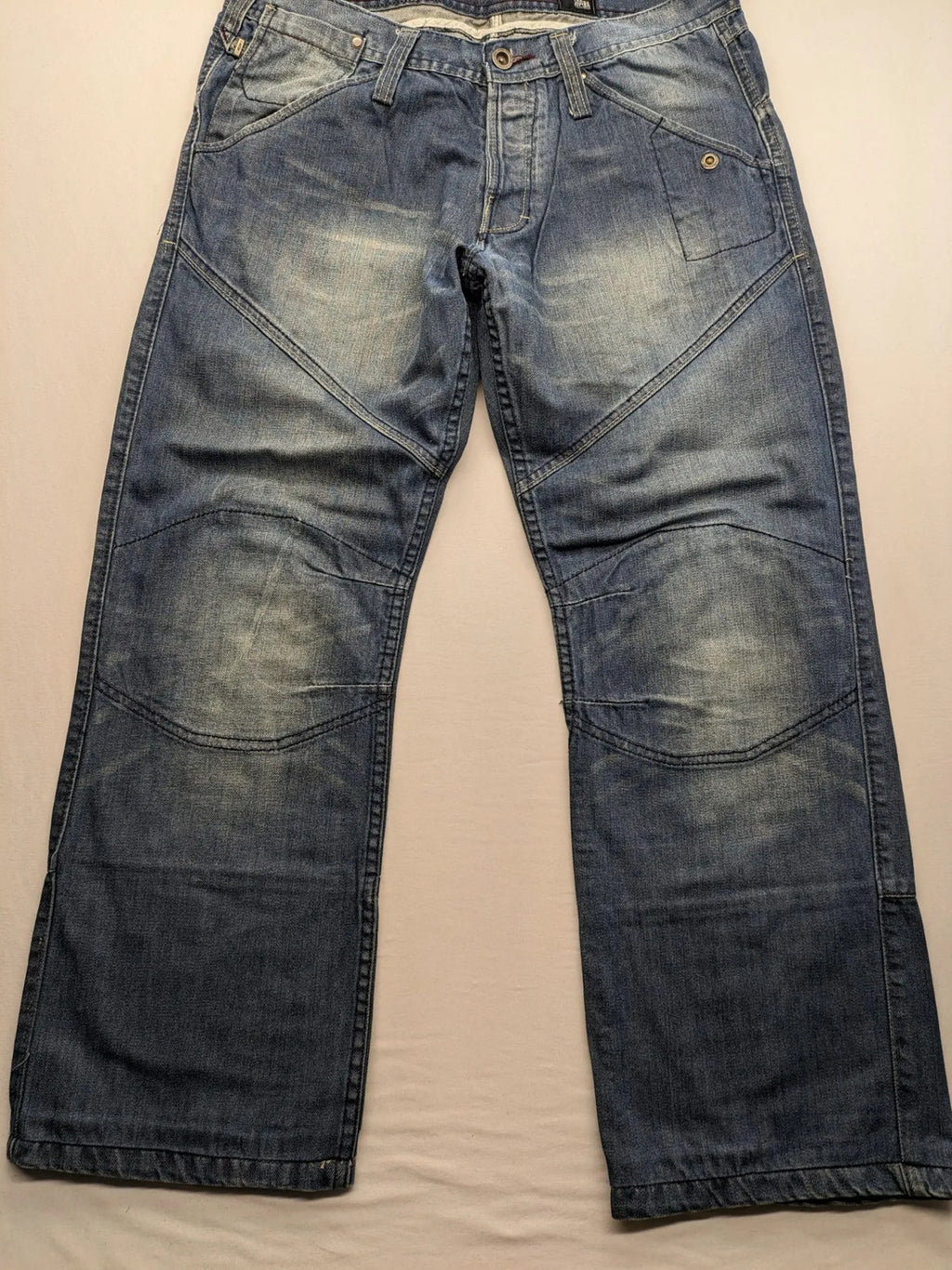 Jack & Jones blue straight jeans with biker panel details and button-fly closure.
