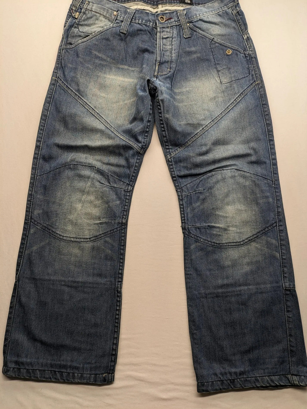 Jack & Jones blue straight jeans with biker panel details and button-fly closure.