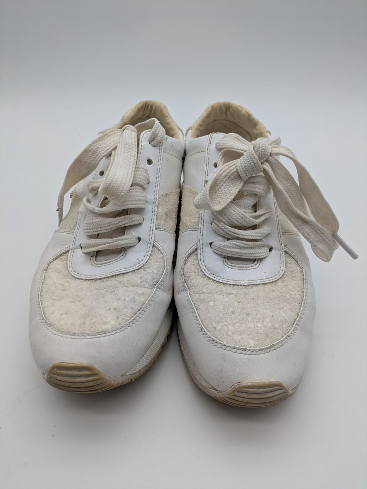 Michael Kors multi sneaker white leather and cream textile with silver logo details.