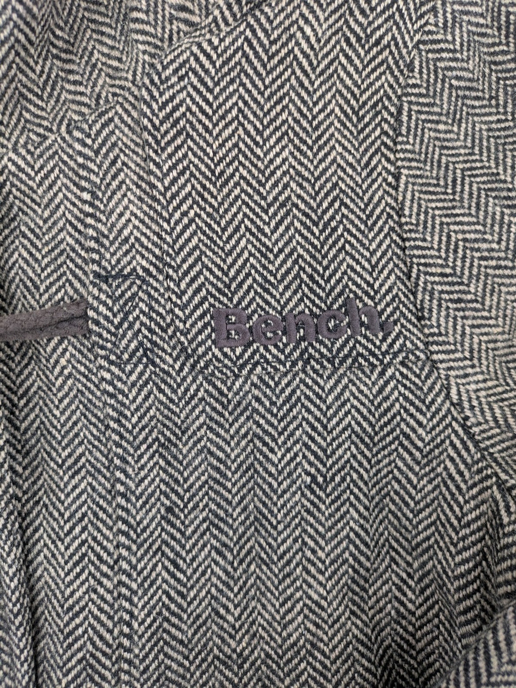 Bench beige-brown duffle coat with herringbone pattern and toggle closures.