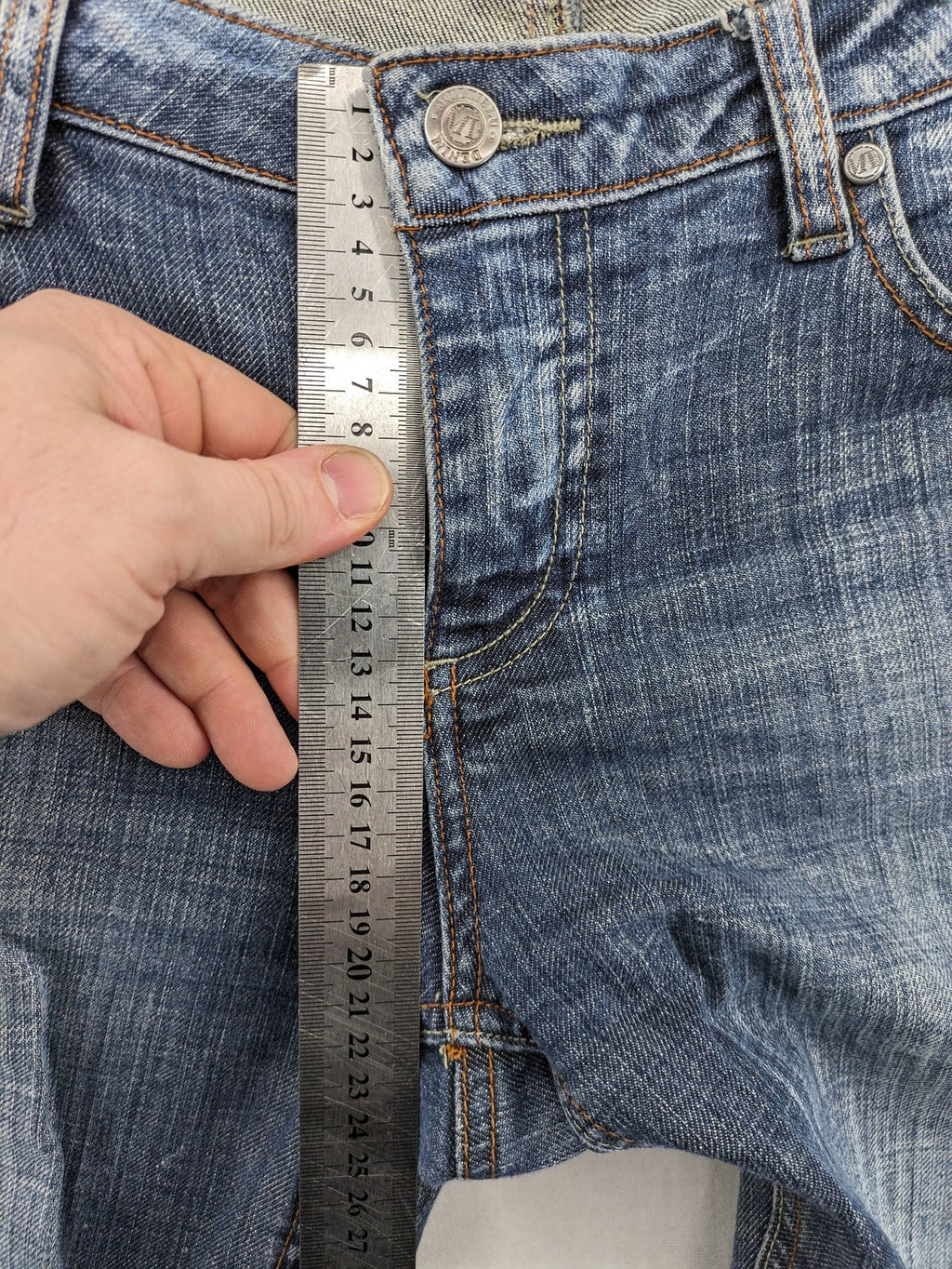 BLU blue straight jeans with washed effect, rolled hem, and five-pocket design.