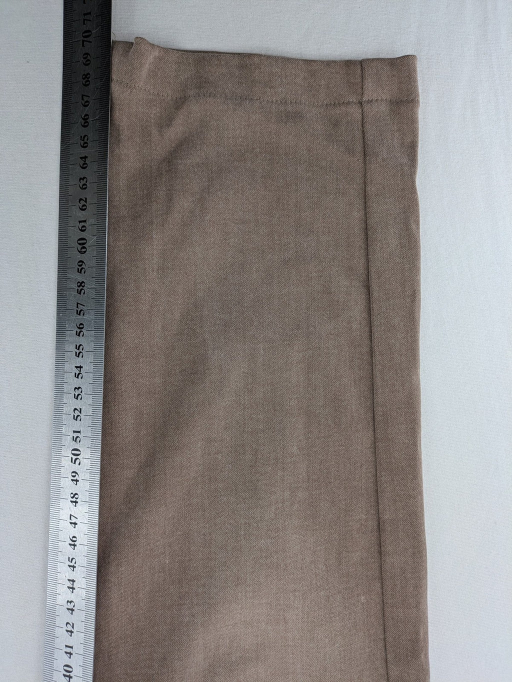 Comma brown straight leg jeans with classic five-pocket design and subtle logo embroidery.