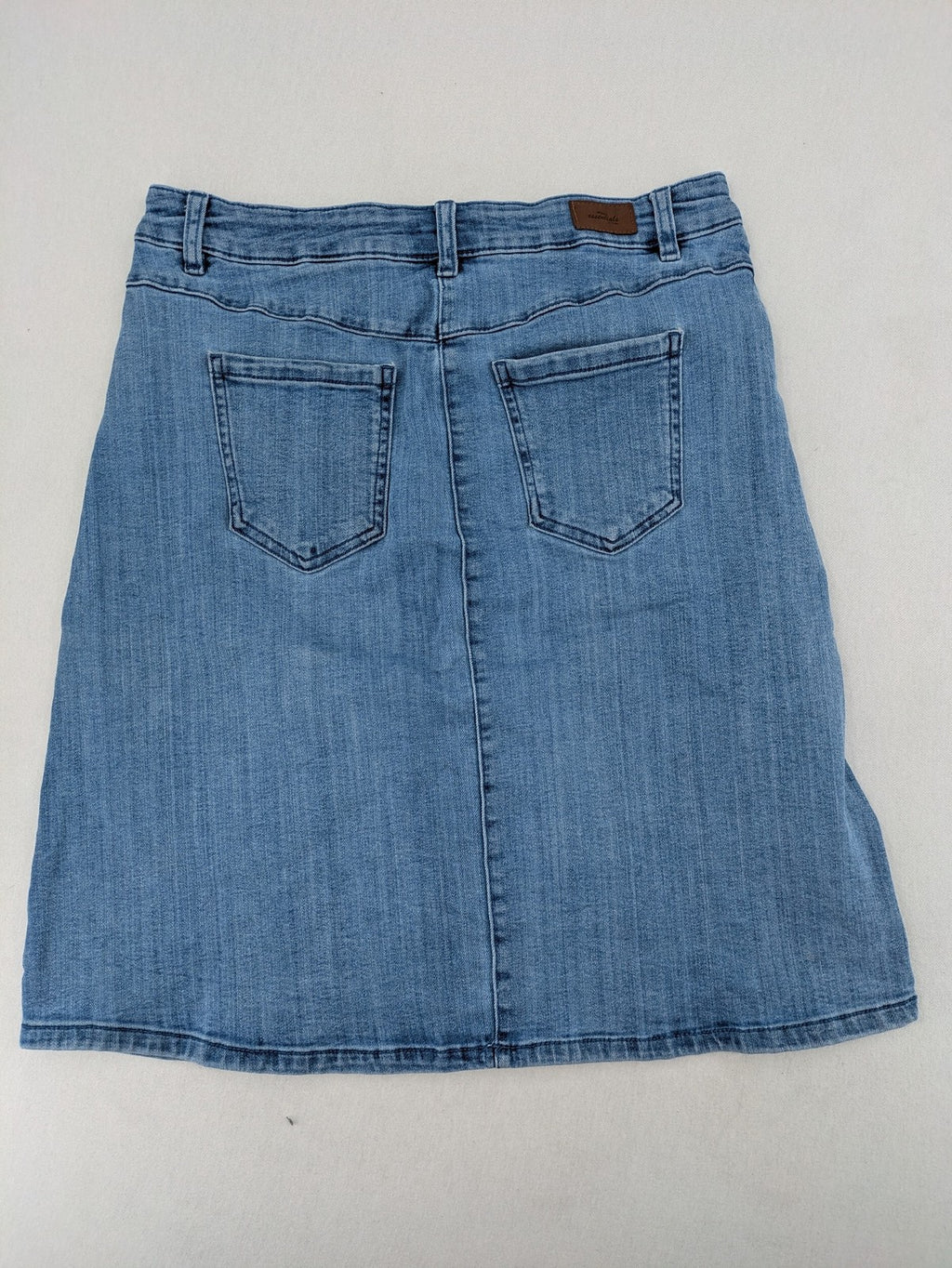 Tchibo blue A-line denim skirt classic five-pocket design with zipper and button closure.