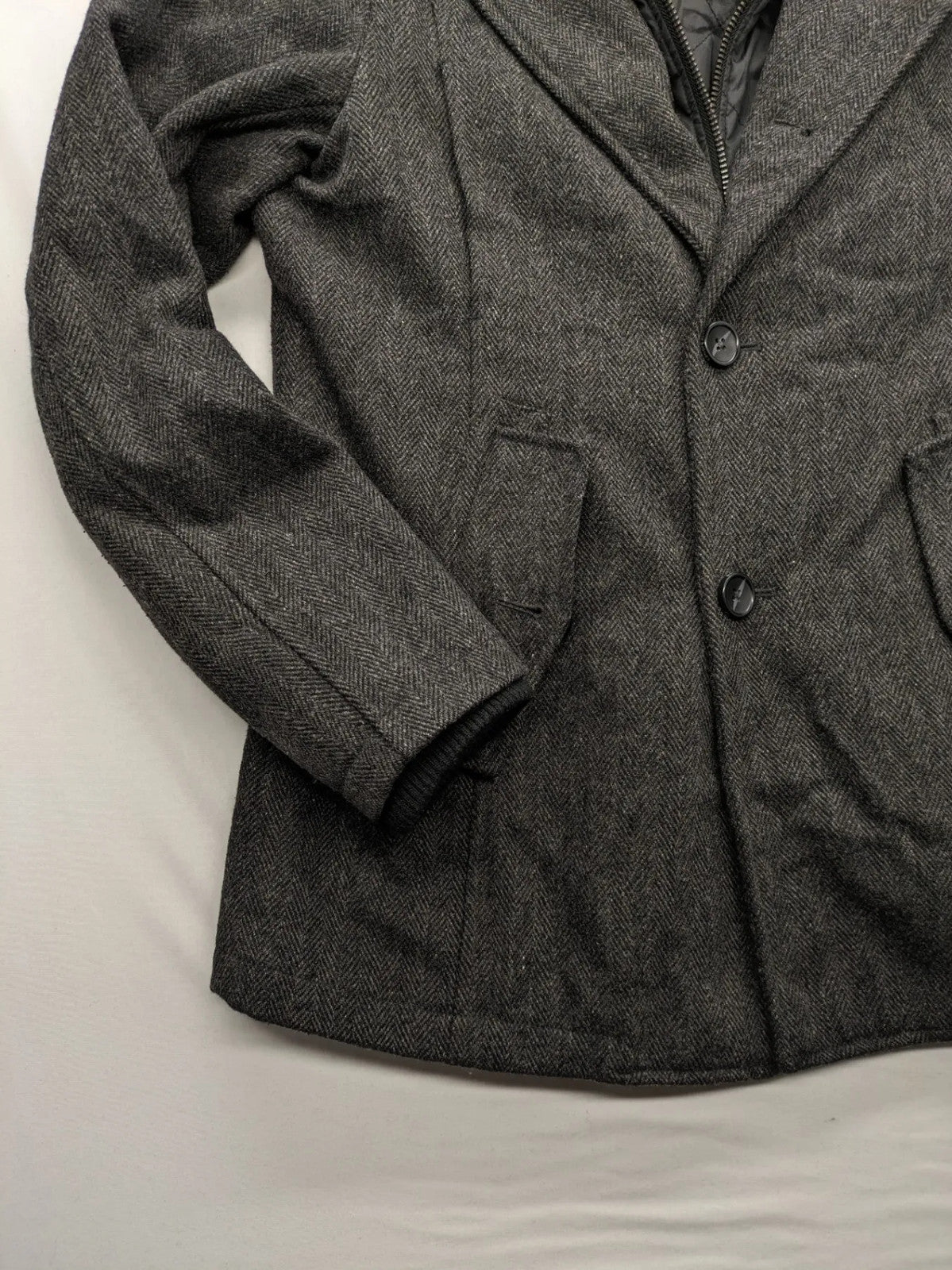 Jack & Jones grey coat herringbone pattern with two-button closure and side pockets.