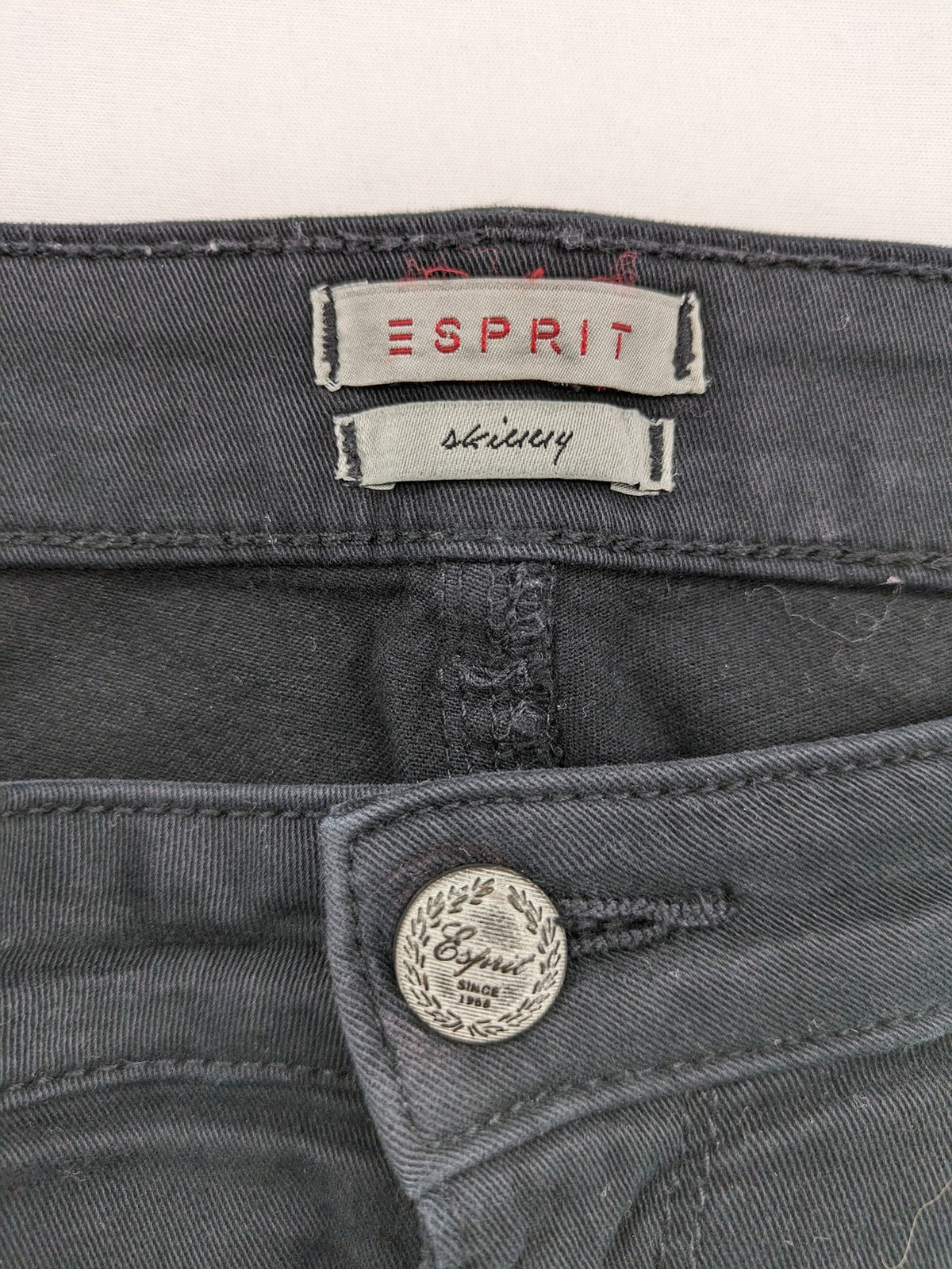 Esprit black skinny jeans with zipper details and cotton-stretch material.