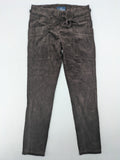 Alma & Lovis brown cord pants paperbag style with belt, made from organic cotton.