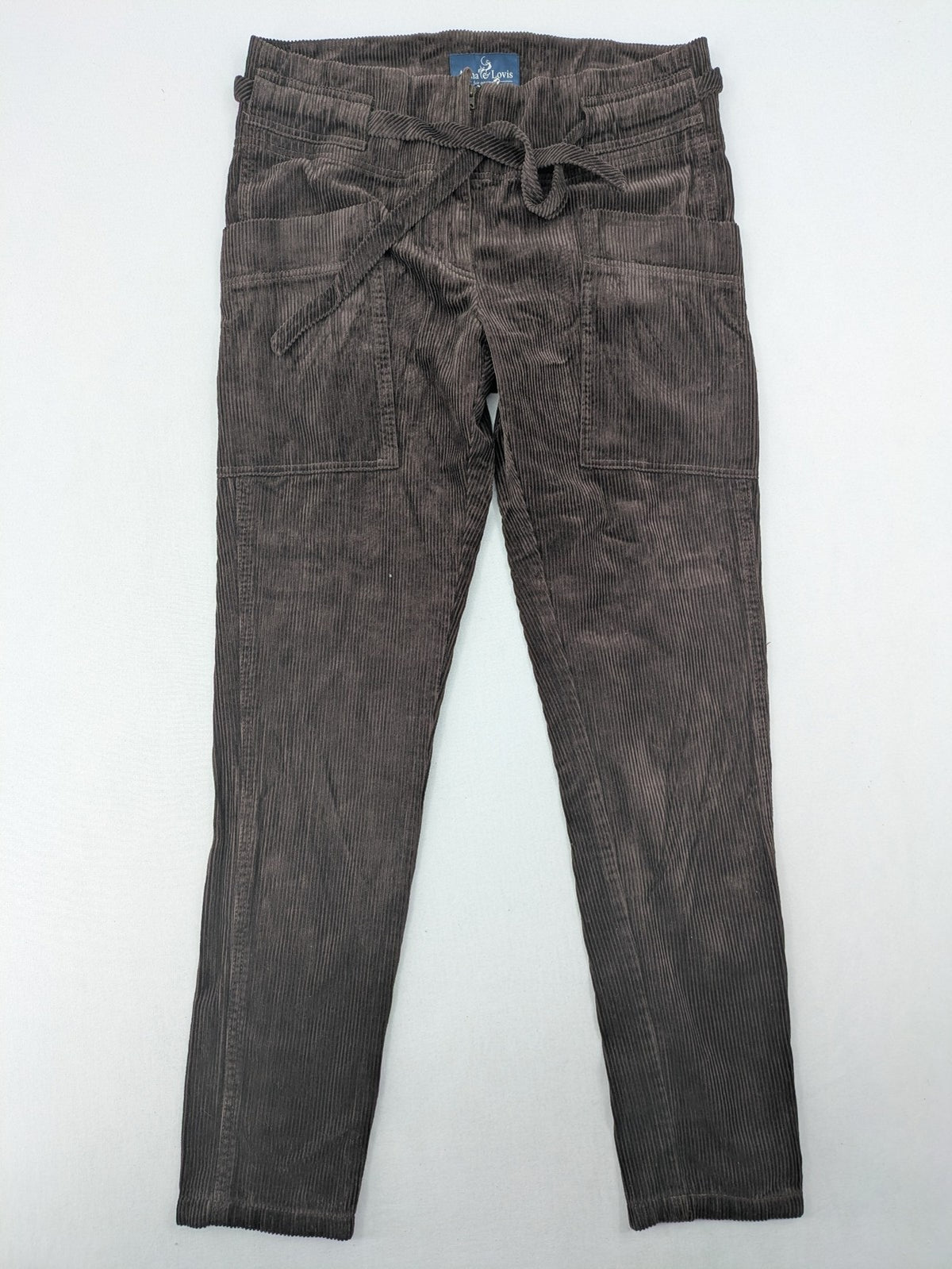 Alma & Lovis brown cord pants paperbag style with belt, made from organic cotton.