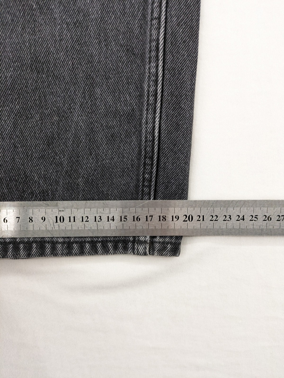 Weekday grey straight jeans with button fly and classic denim design.