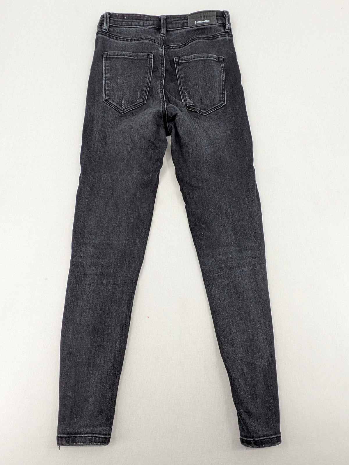 Stradivarius grey skinny jeans super high waist distressed with classic five-pocket design.