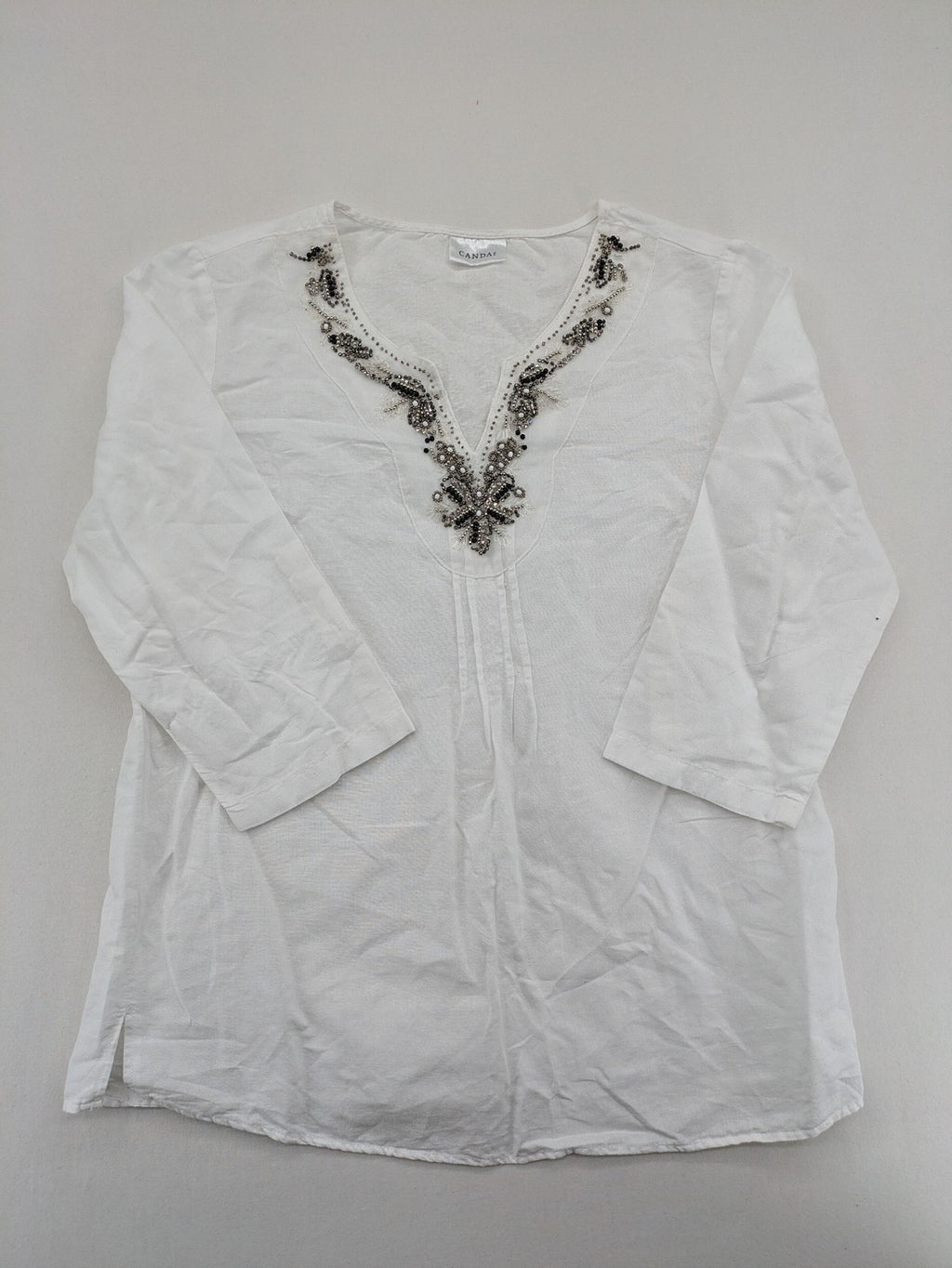 Canda white tunic top with embroidered V-neck, pearl and sequin details, 3/4 sleeves.