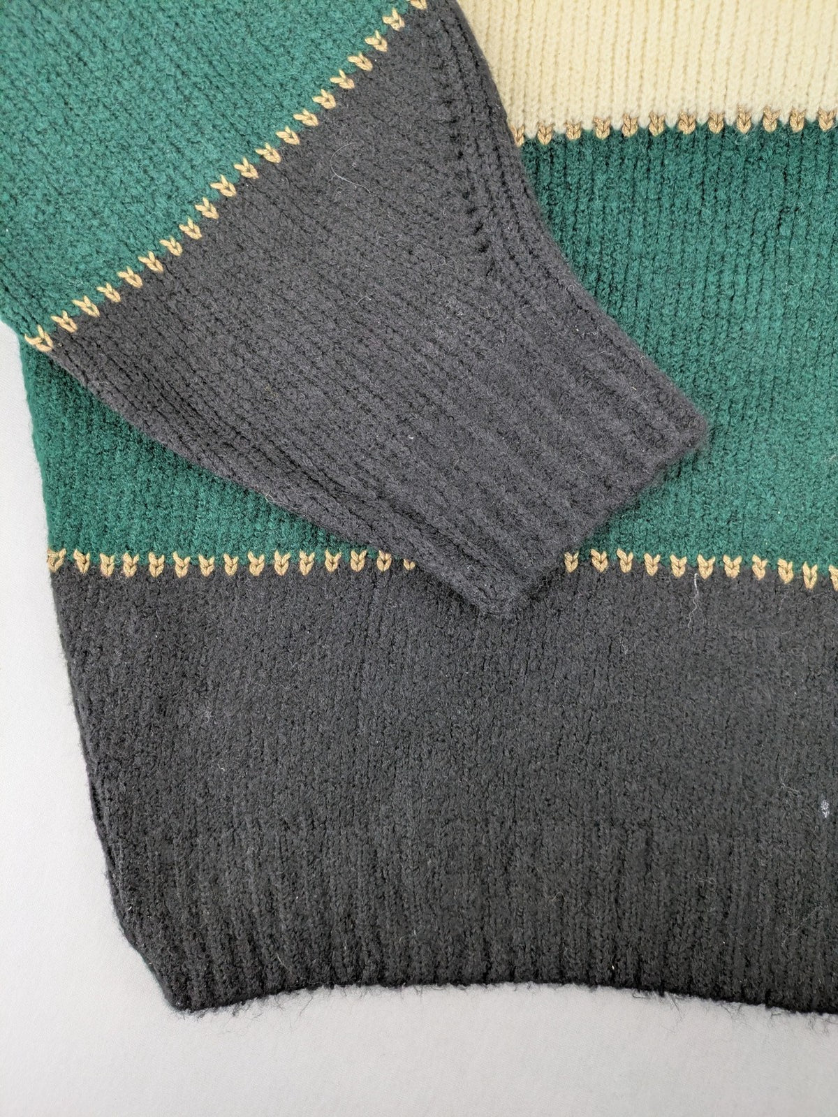 Guido Maria Kretschmer multi turtle neck jumper colorblock design with bold horizontal stripes.