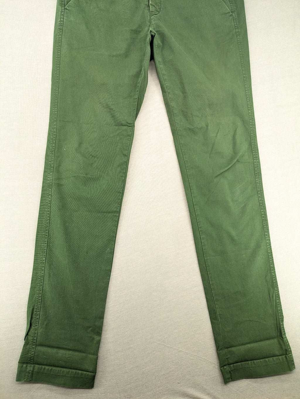 Mason's green chino pants with striped red and blue waistband, cotton stretch material.