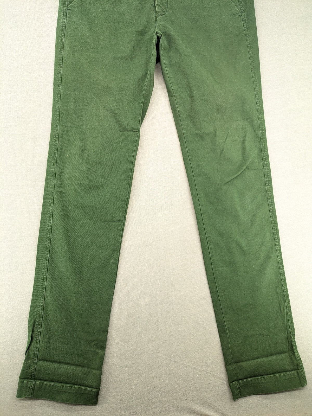 Mason's green chino pants with striped red and blue waistband, cotton stretch material.