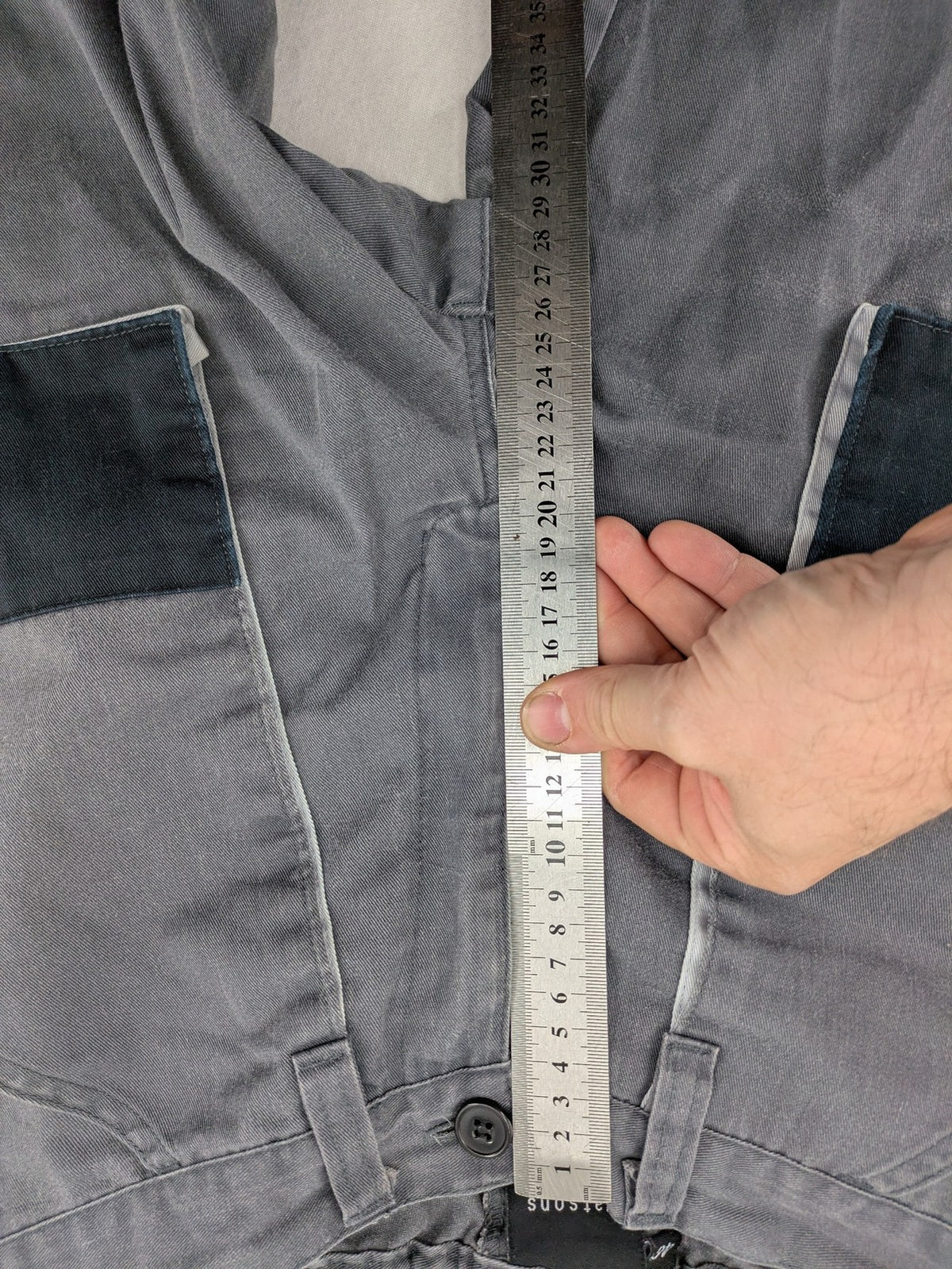 Watsons grey and black hunting tactical pants with Cordura reinforcements and elastic waistband.