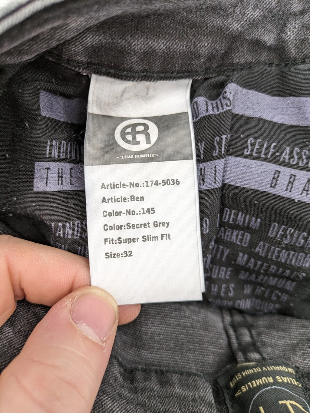 Elias Rumelis grey super slim fit jeans with stitched logo and subtle used look.