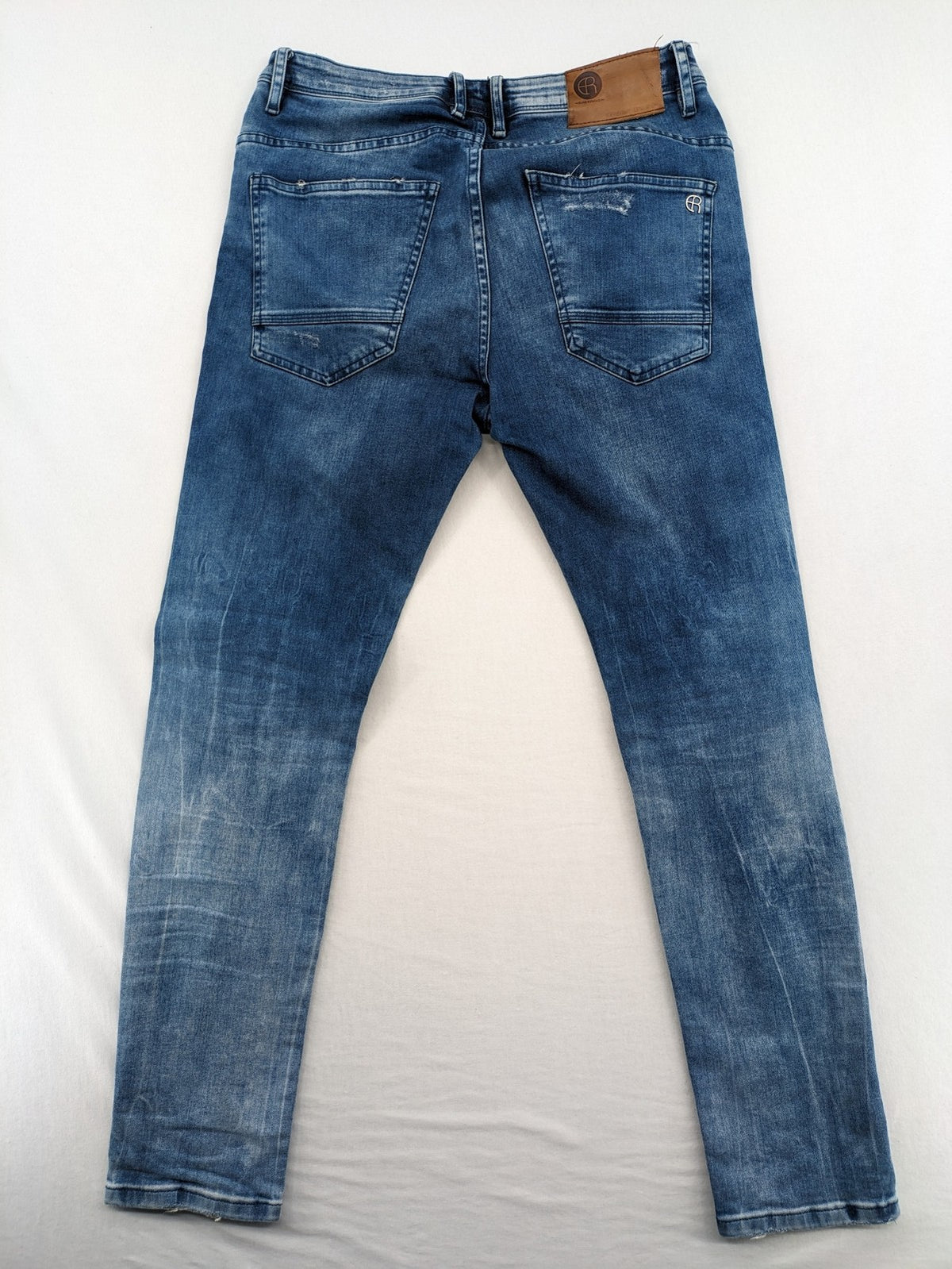W32 blue straight jeans distressed details tapered fit button fly design