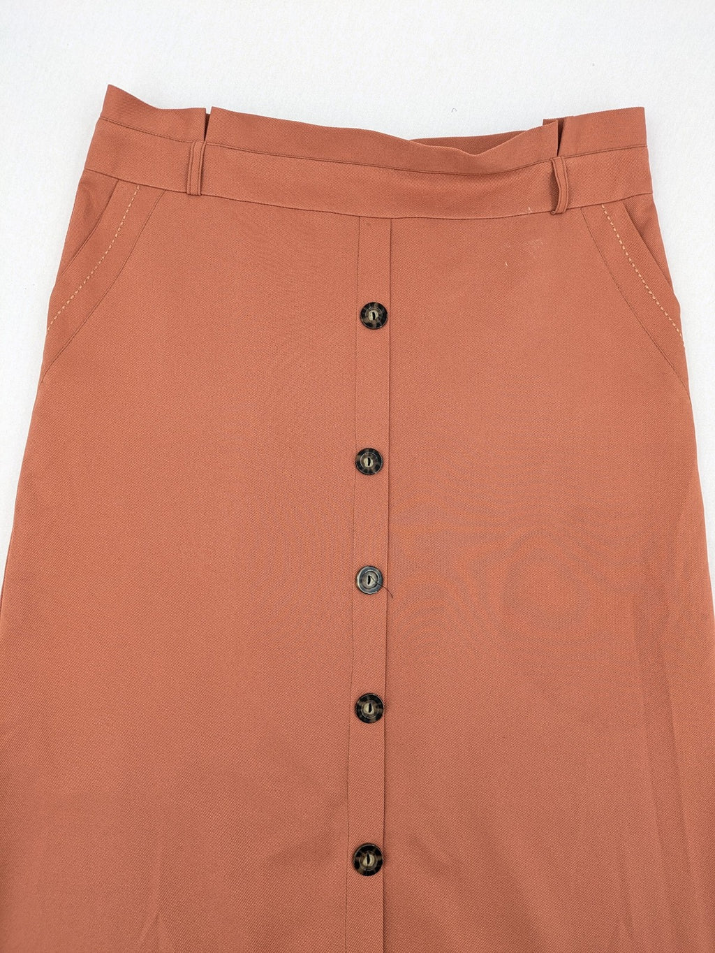 Moda orange long skirt A-line cut with front button placket and belt loops.