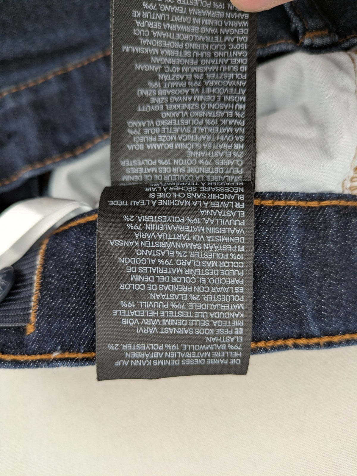 H&M blue skinny fit jeans with classic 5-pocket style and button closure.