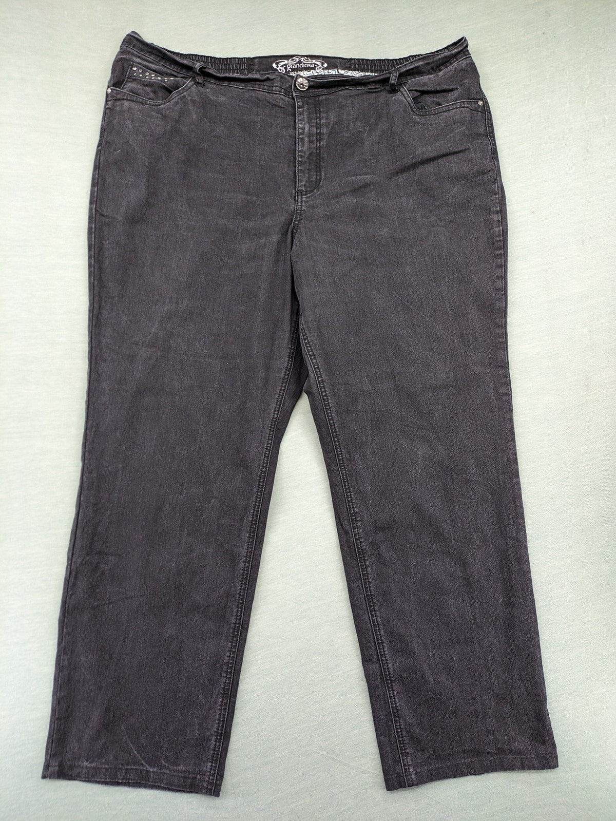 Charles Vögele grey straight jeans with elastic waistband and decorative studs on pockets.