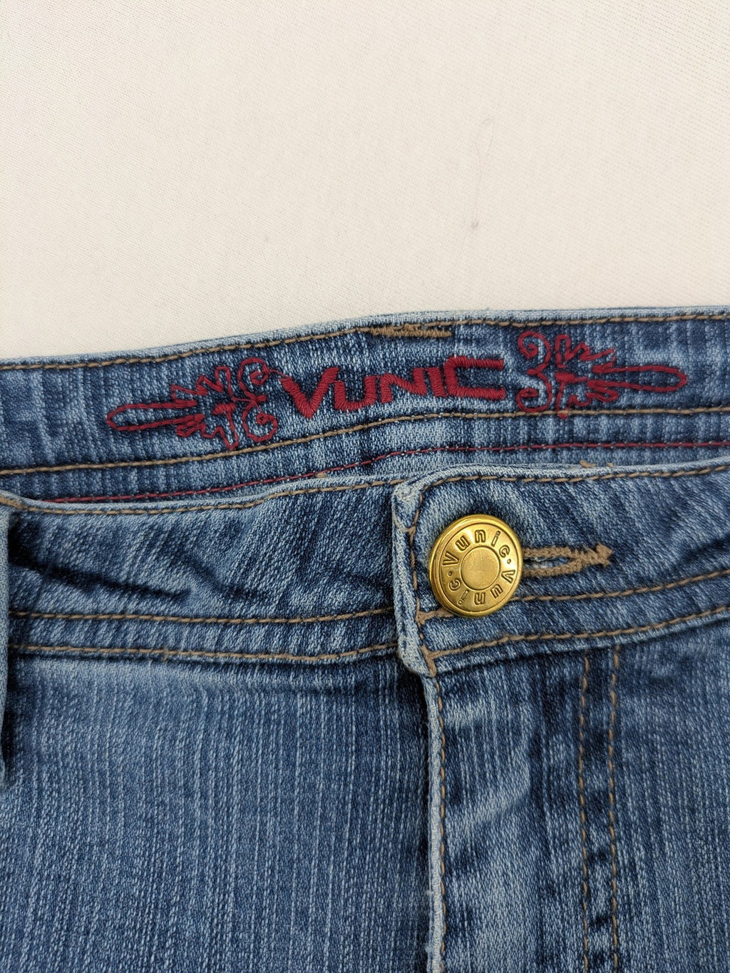 Vunic blue bootcut jeans medium wash five-pocket style with zipper and button closure