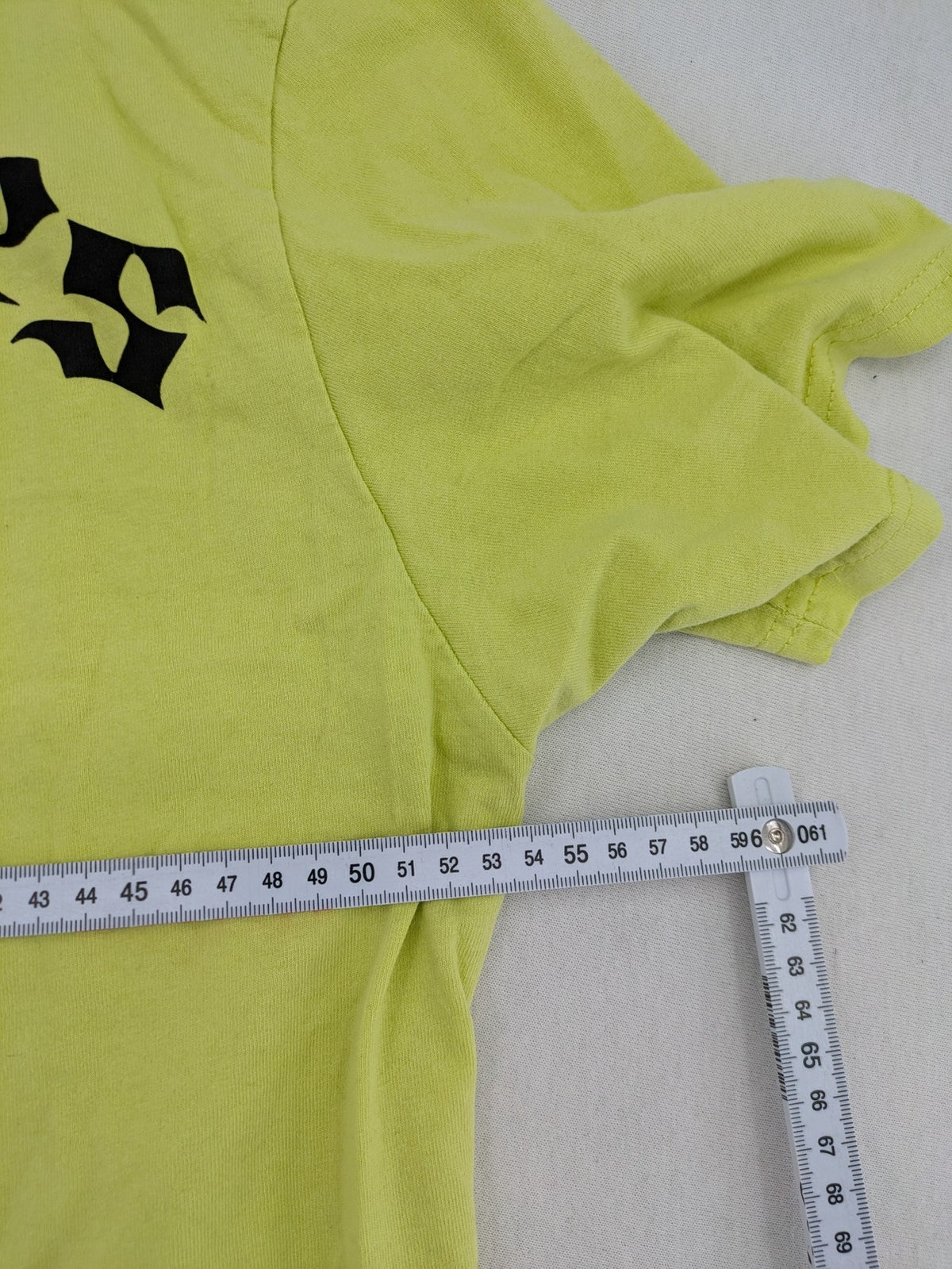 Primark yellow band t-shirt featuring Gothic LA graphic print and "PRESENT" patch.