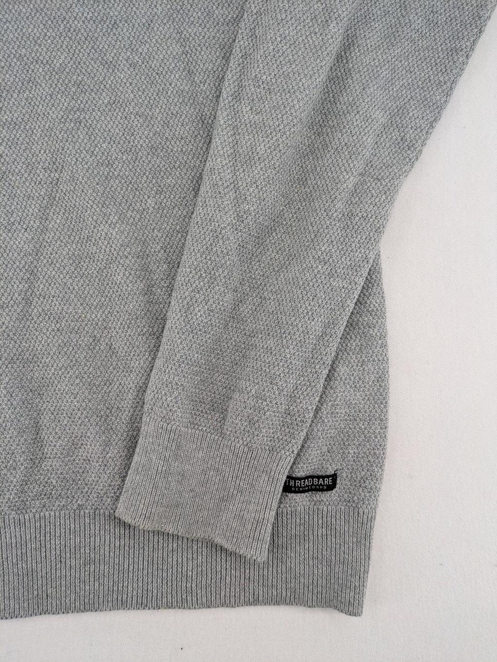Threadbare grey turtle neck jumper with textured knit and dark grey collar trim.