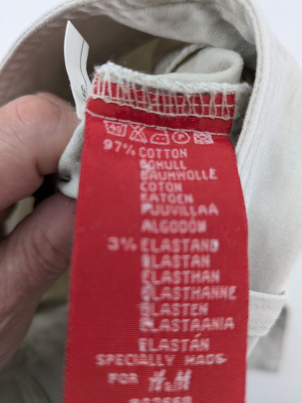 H&M L.O.G.G beige bootcut pants with double button closure and stretch cotton material.