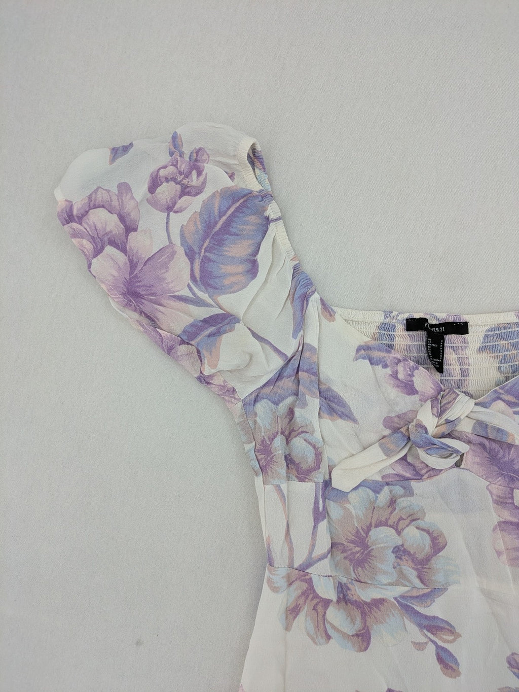 Forever 21 women's midi dress white with blue and purple floral pattern, smocked bodice, puff sleeves.
