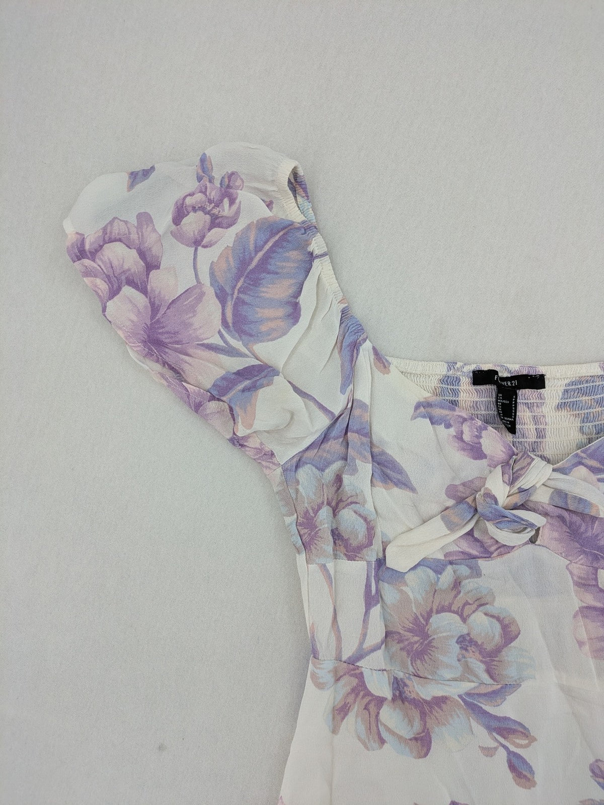Forever 21 women's midi dress white with blue and purple floral pattern, smocked bodice, puff sleeves.