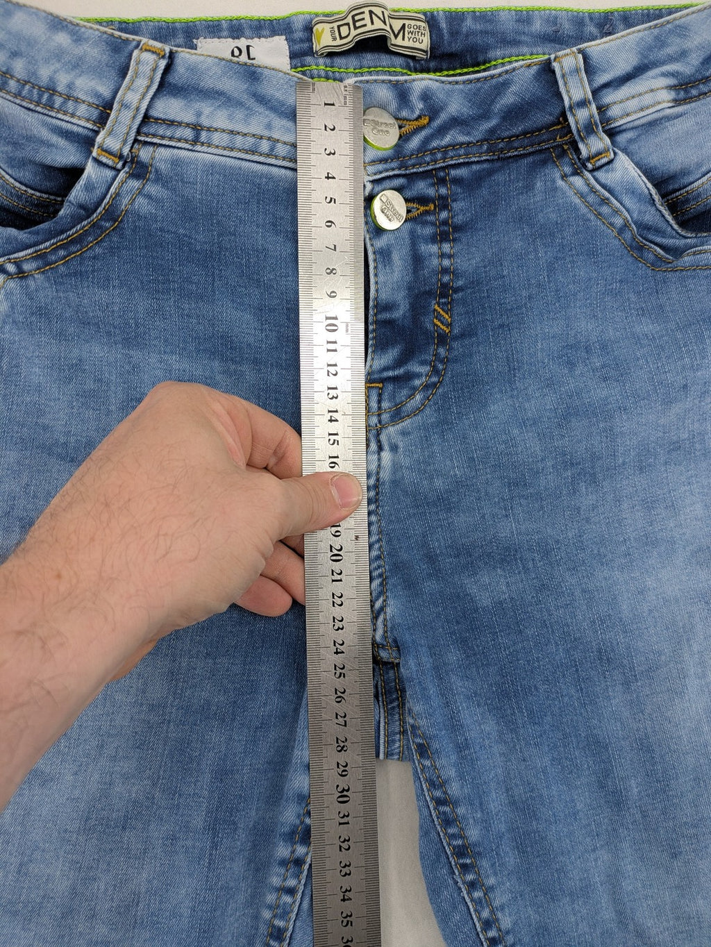 Street One blue straight jeans with green patterned cuffs and button fly detail.