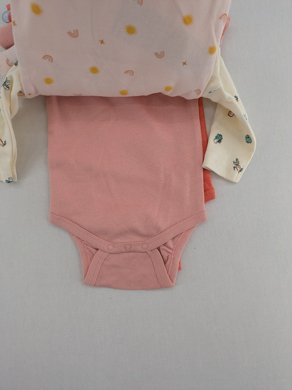 Ergee baby bodysuits set blue cream orange various cute patterns and wrap design.