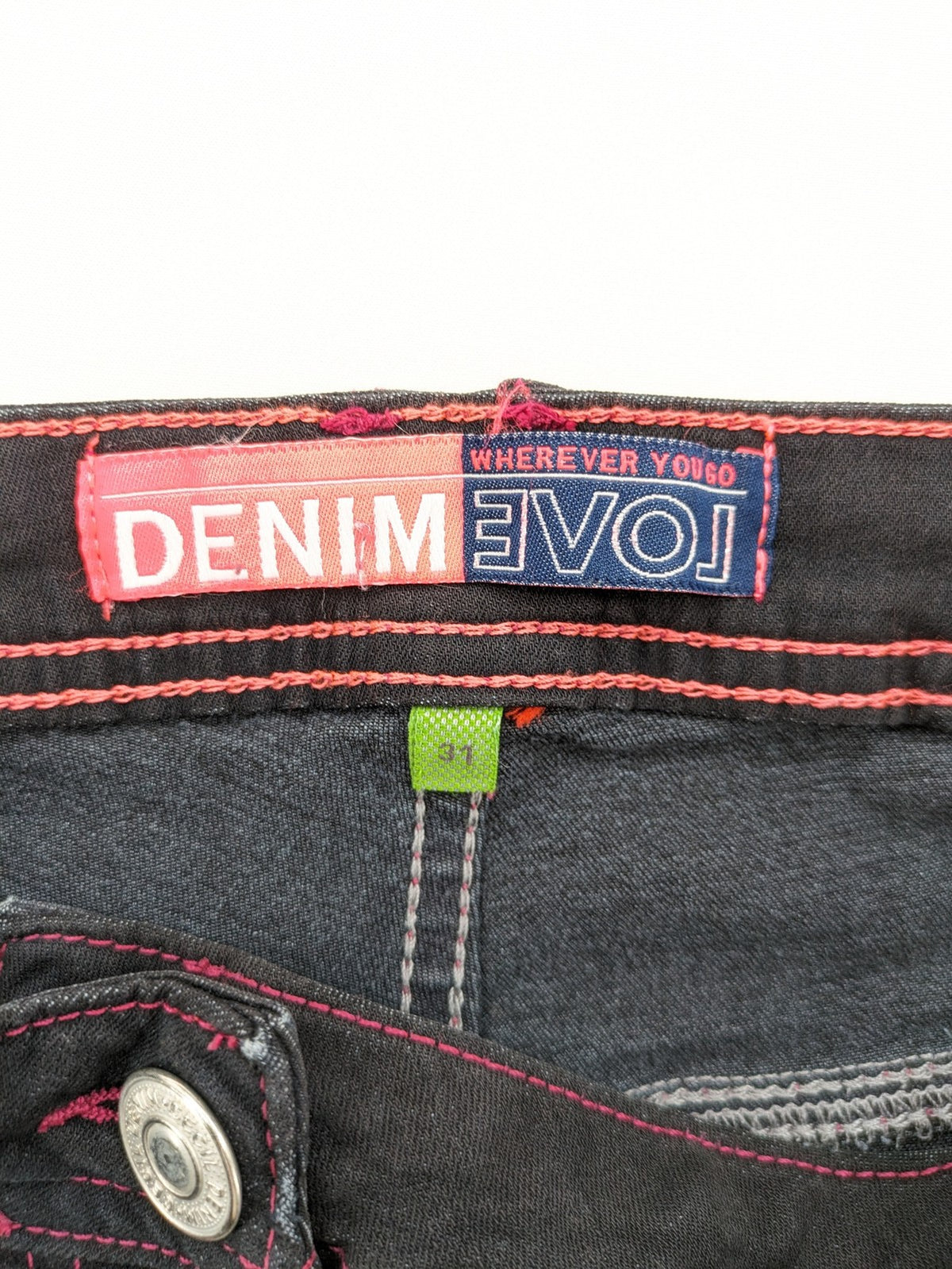 Denim black straight jeans with pink contrast stitching and classic 5-pocket style.