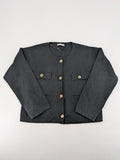 Reserved gold turtle neck jumper with black knit, gold button details and front pockets.