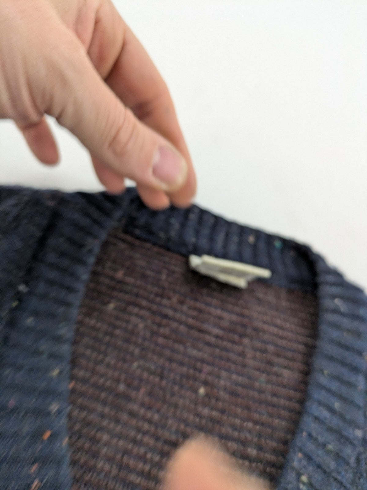 Angelo Litrico blue vest with V-neck, striped pattern, and textured melange design.